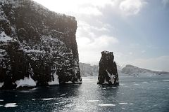 03B Steep Cliffs And Rock Spike Guard The Neptunes Bellows Narrow Opening To Deception Island On Quark Expeditions Antarctica Cruise Ship.jpg